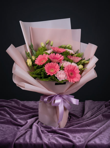 Bless bouquet of pink gerberas and ruffled carnations, second view