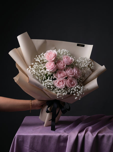 Astra bouquet of velvety pink roses with white fillers, second view