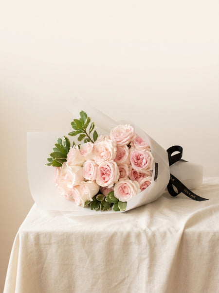 Éloise Blush bouquet of blush-toned roses in soft wrapping