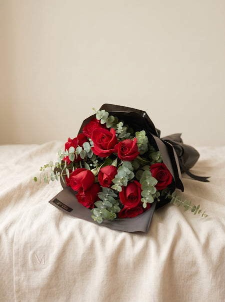 Aurelia Noir bouquet of twelve red roses in black wrapping, second view
