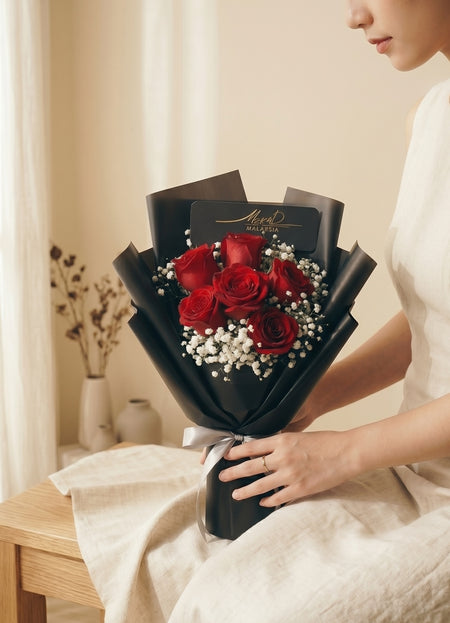 Celeste Noir bouquet of six red roses in black wrapping, second view