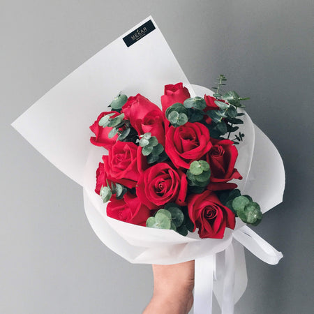 Aurelia Pearl bouquet of twelve red roses in pearl and ivory wrapping