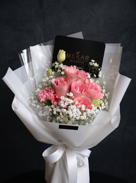 Seri compact bouquet in vibrant pink with airy white fillers, second view